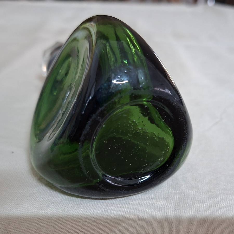 2 perfume bottles approx 16 cms tall - stamped gero. Cut crystal stoppers