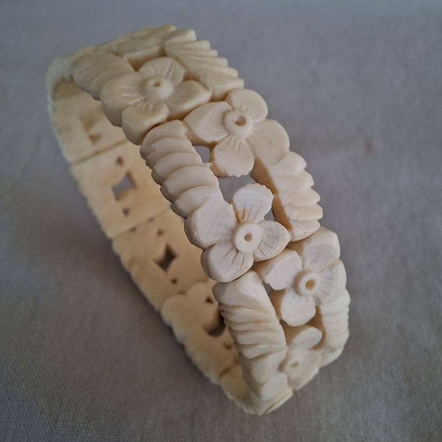 Carved cream coloured floral bangle, bracelet - bone?