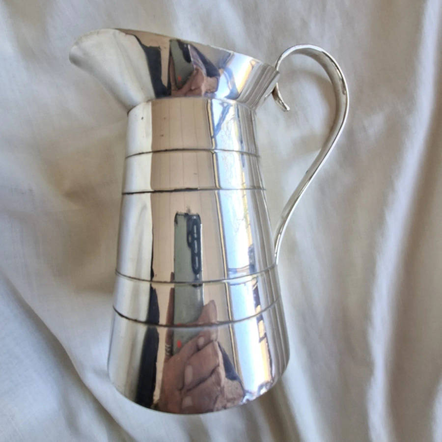 Silver plated jug -  J C and C  14 cms tall