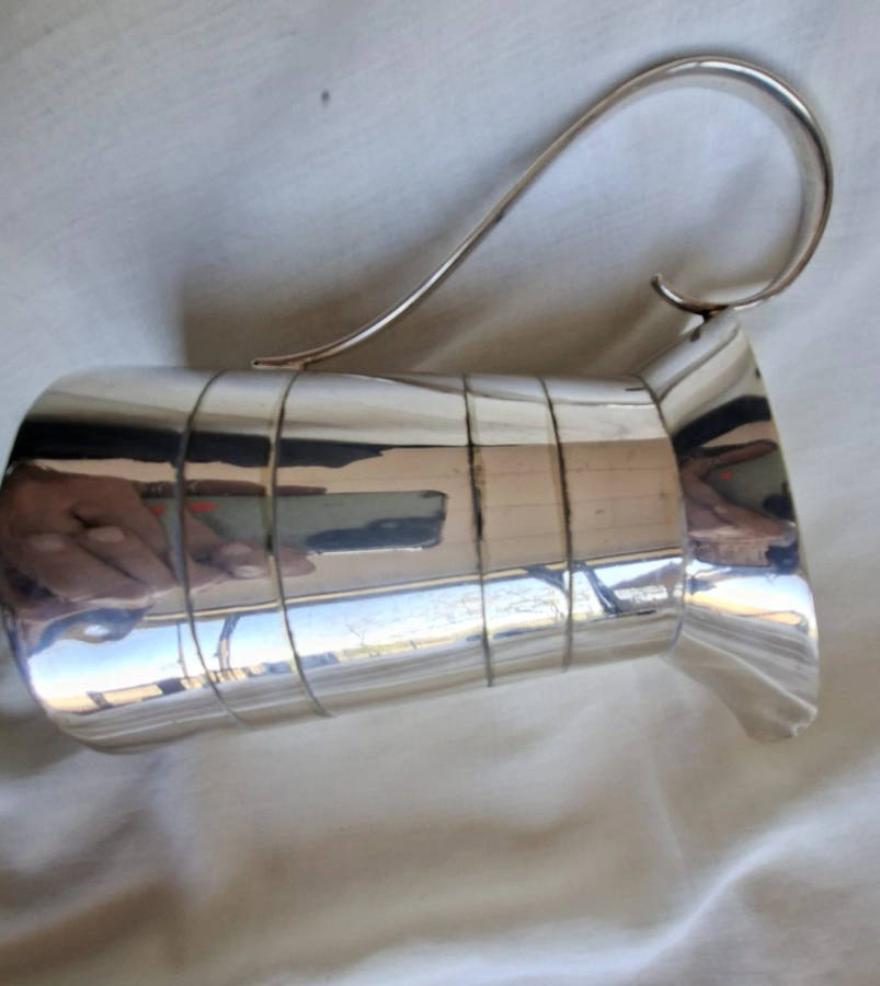 Silver plated jug -  J C and C  14 cms tall