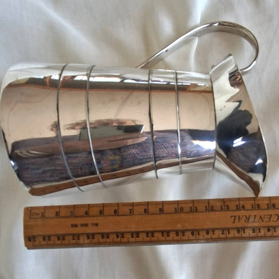 Silver plated jug -  J C and C  14 cms tall