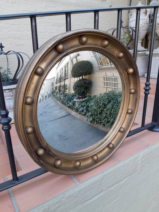A 20th Century Regency Style Gilt Painted Convex Mirror