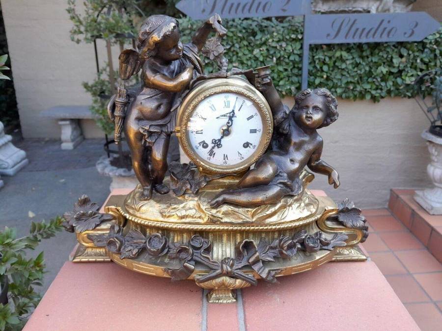 A French Louis XVI Bronze And Gilt Clock