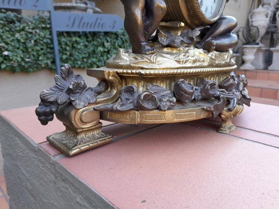 A French Louis XVI Bronze And Gilt Clock