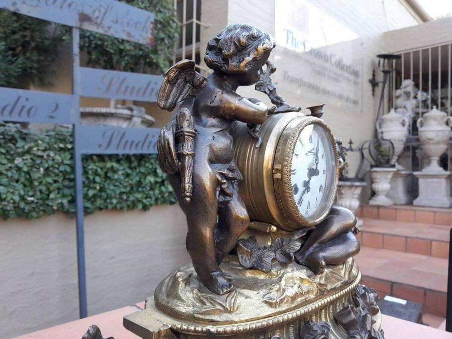 A French Louis XVI Bronze And Gilt Clock