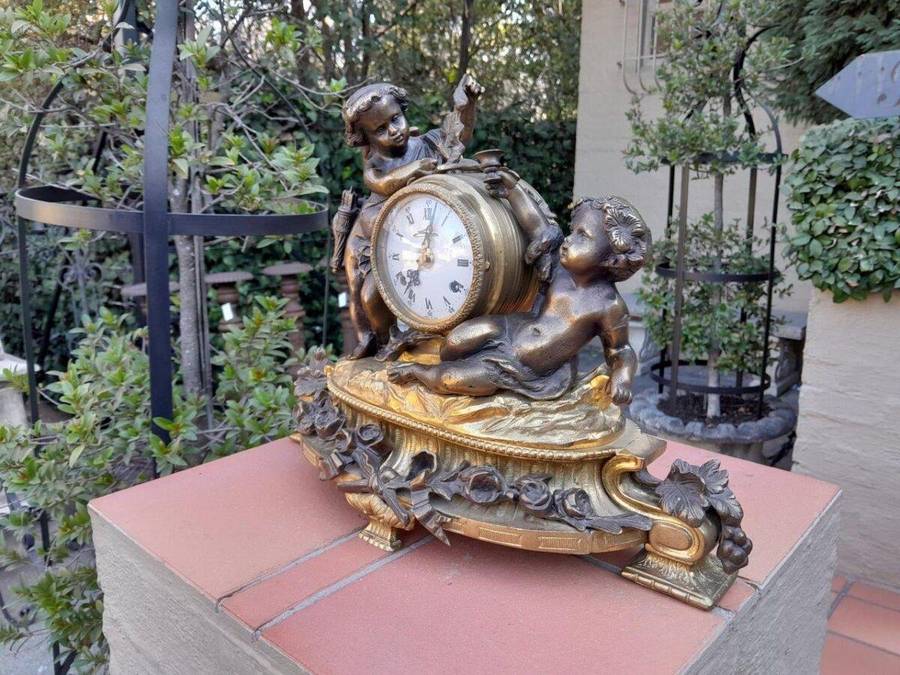 A French Louis XVI Bronze And Gilt Clock