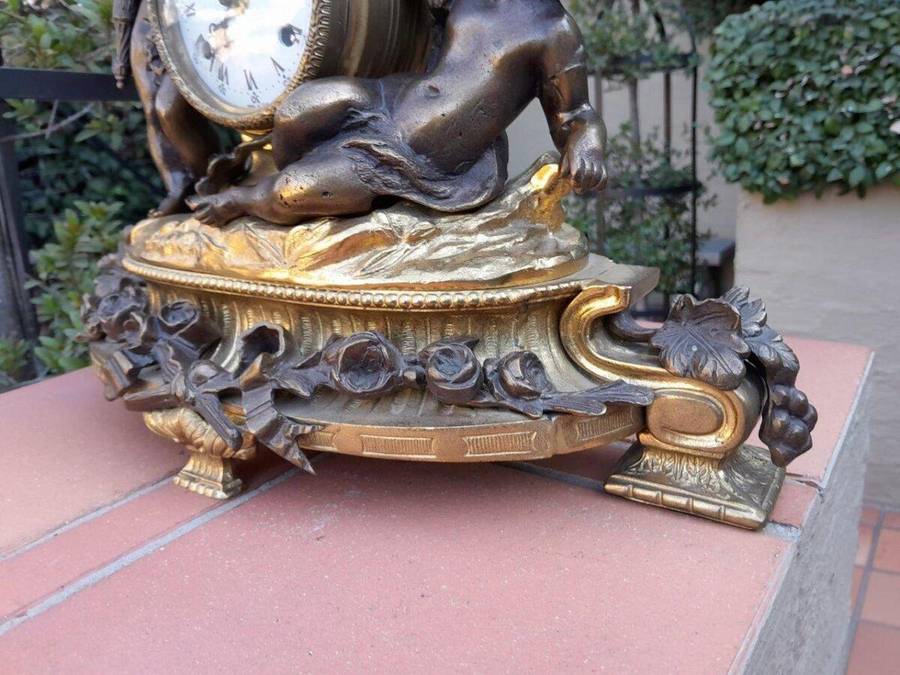 A French Louis XVI Bronze And Gilt Clock