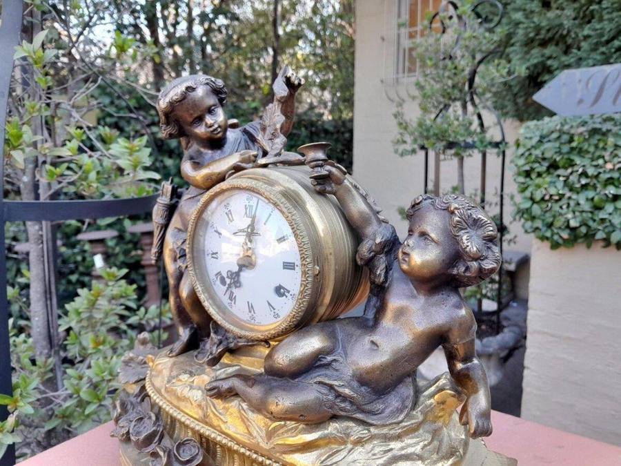 A French Louis XVI Bronze And Gilt Clock
