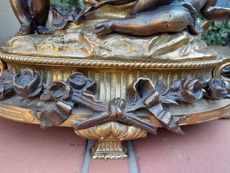 A French Louis XVI Bronze And Gilt Clock