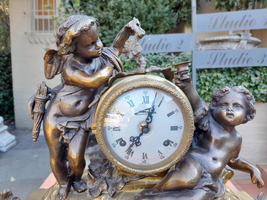 A French Louis XVI Bronze And Gilt Clock