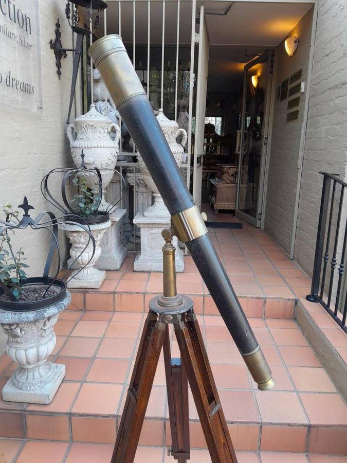 An Antique Brass And Leather Telescope On Brass And Oak Tripod Stand