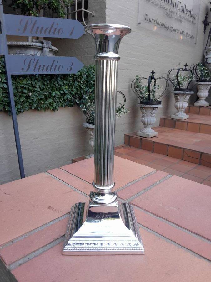 A Pair Of Silver-Plated Column Candlesticks