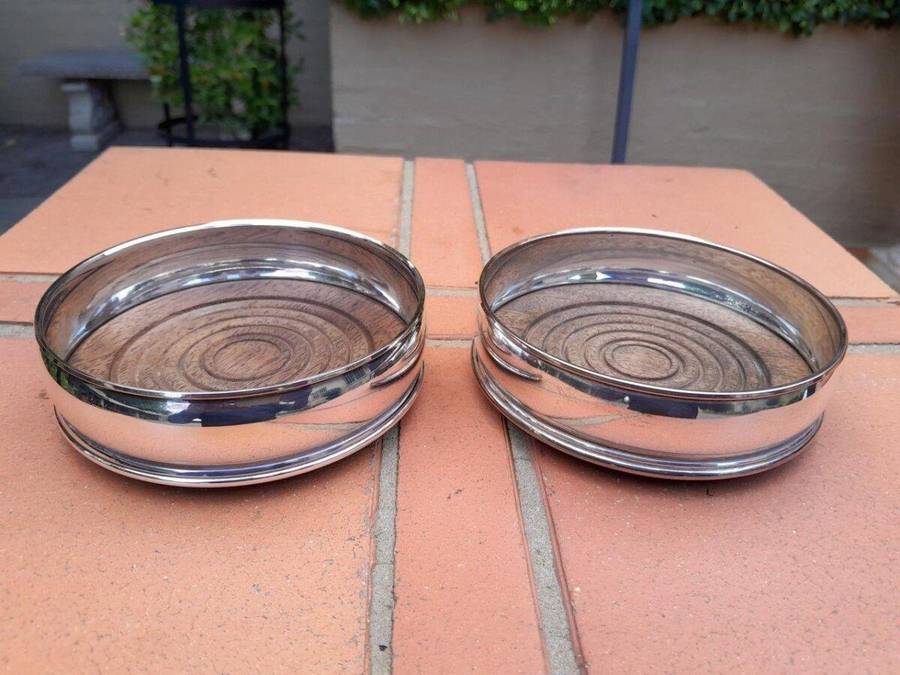 A 2oth Century Pair Of Electroplated Wine / Bottle Coasters