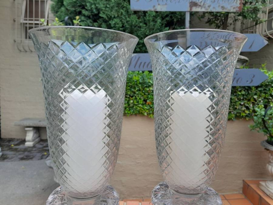 A Pair Of French Style Candle Holders With Candles