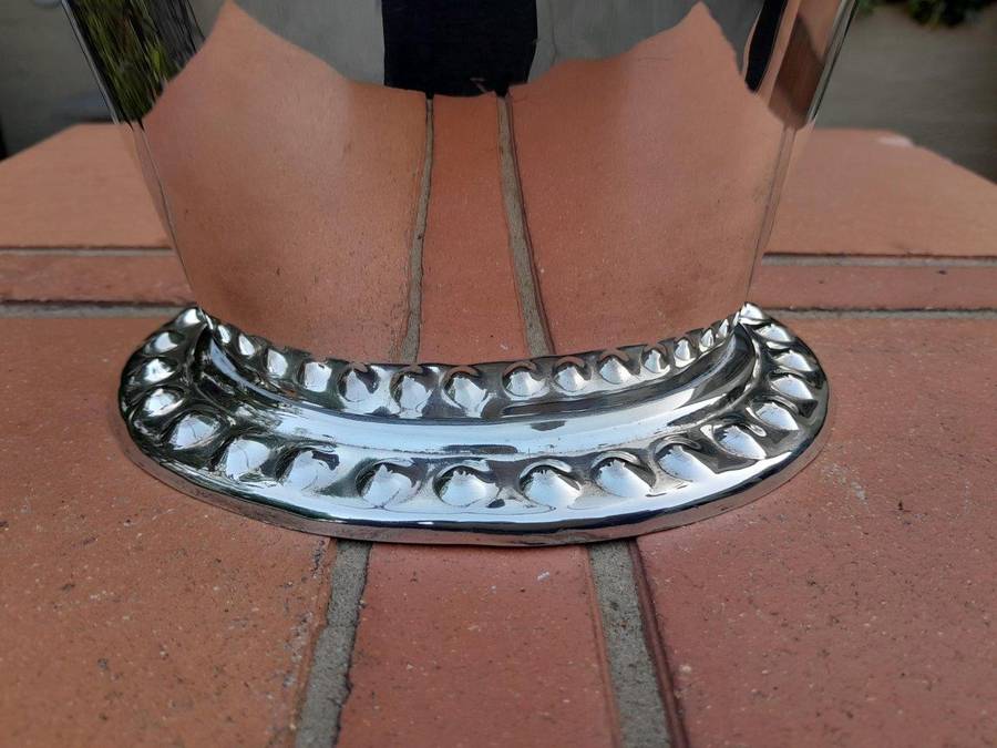 A Silver-Plate Ice Bucket  The Wavy Rim Above A Tapering Body, Applied Opposing Handles, Raised ...