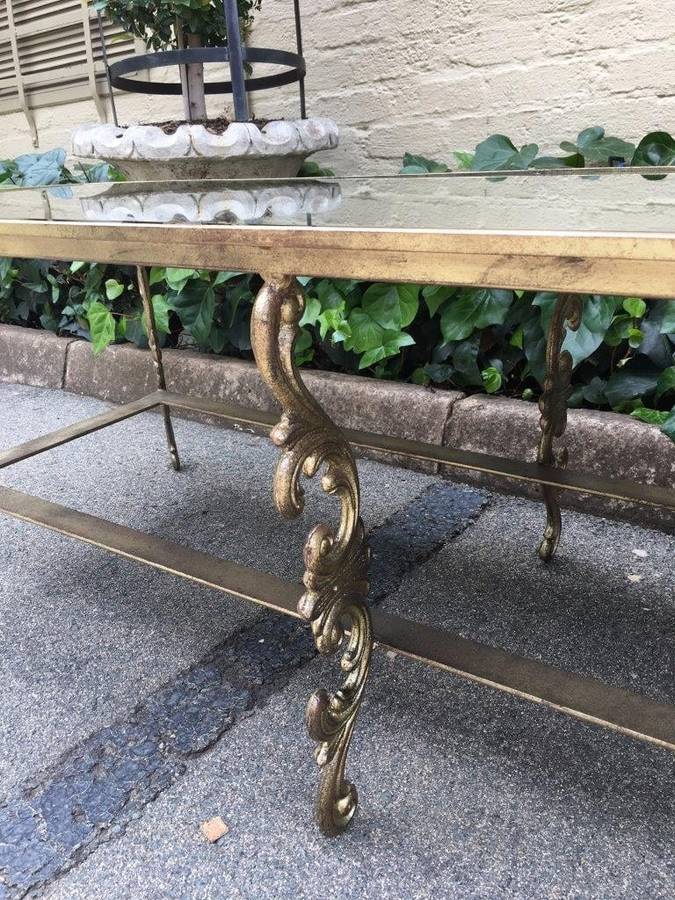 A Wrought Iron and Gilded Coffee Table With Mirror top Custom-Made for The Crown Collection