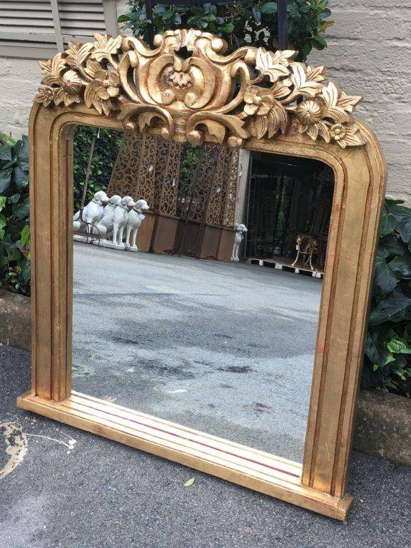 A 20TH Century Pair of Hand Carved and Gilded Designer Mirrors