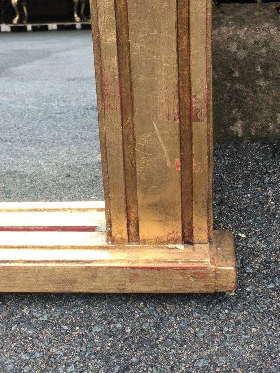 A 20TH Century Pair of Hand Carved and Gilded Designer Mirrors