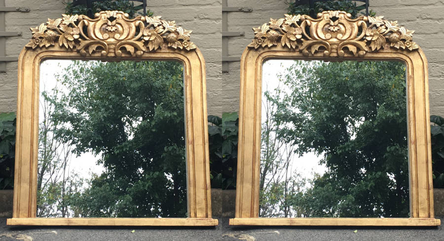 A 20TH Century Pair of Hand Carved and Gilded Designer Mirrors