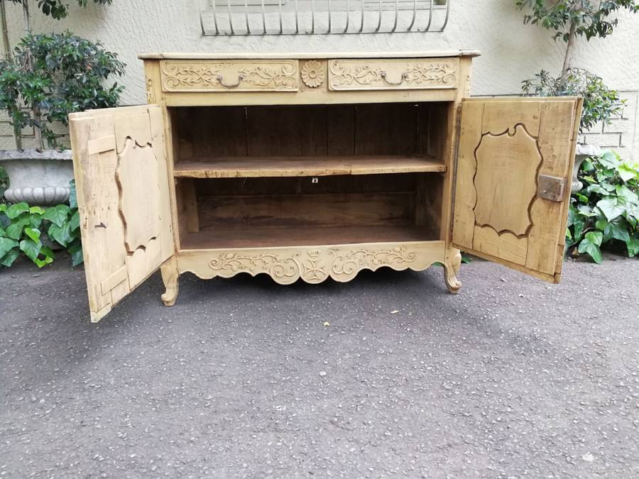 A Provincial Style French Oak Server in a Contemporary Bleached / Natural Wood Finish with Cream ...
