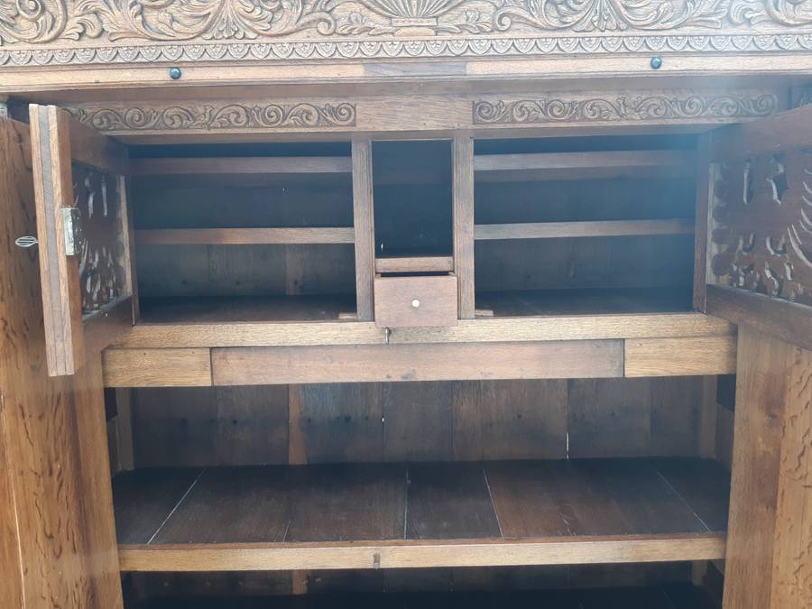 An Early 19th Century Renaissance Ornately Carved Oak Kussenkast On Bun Feet (Useful for TV or st...