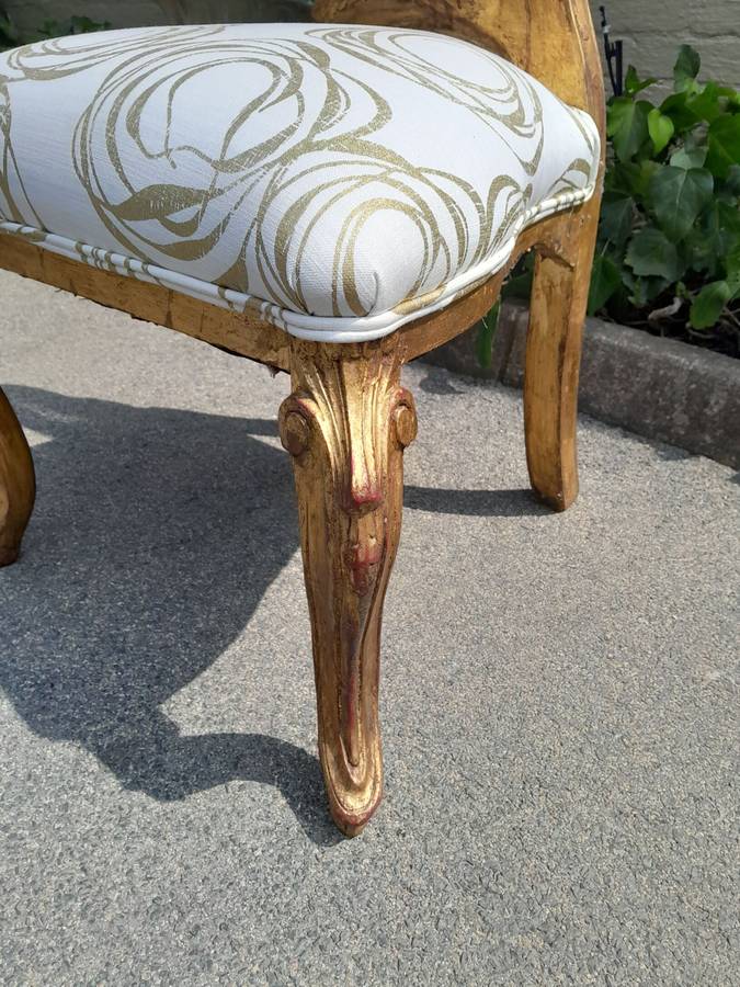 A 20th Century Rare Pair of Baroque Style Carved and Hand Gilded Throne Chairs Upholstered in a C...