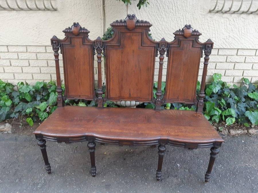 French 19th Century oak carved 3-seater bench, 129cm high, 135cm wide