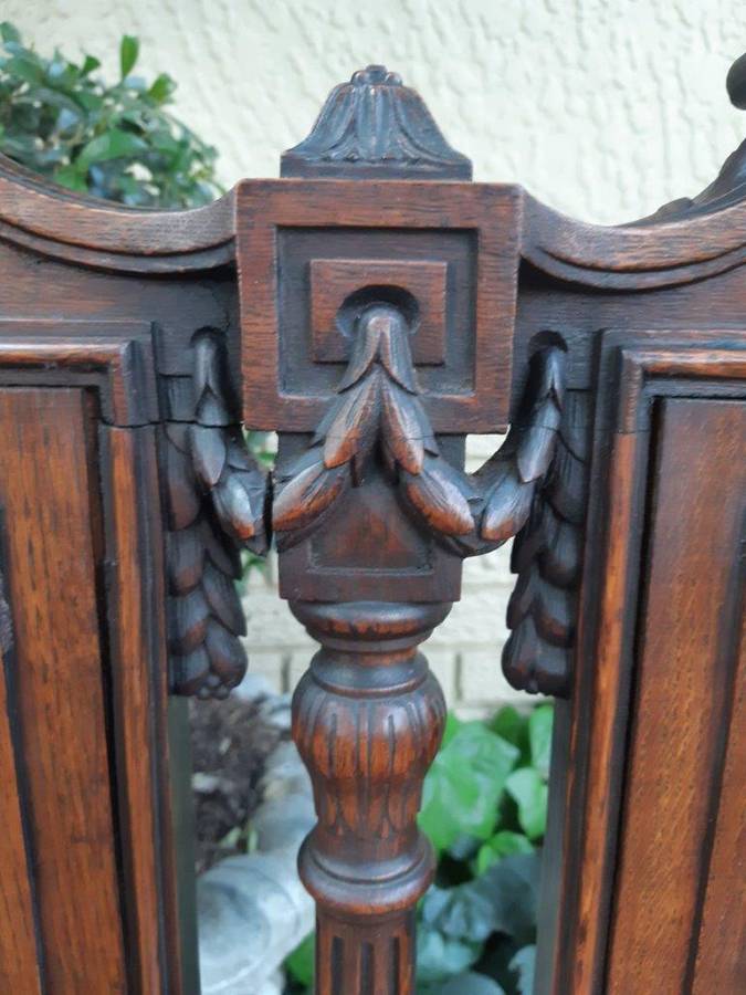 French 19th Century oak carved 3-seater bench, 129cm high, 135cm wide
