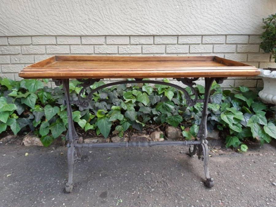 A Victorian Cast-Iron And Pine Table