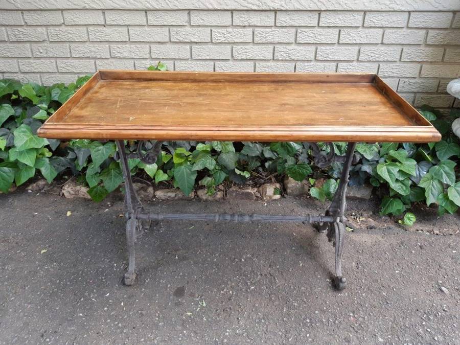 A Victorian Cast-Iron And Pine Table