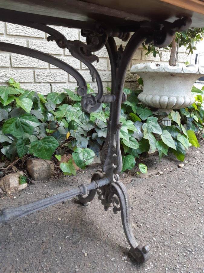 A Victorian Cast-Iron And Pine Table