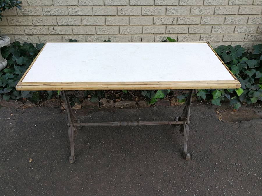 An Antique Victorian Cast Iron Table with a Marble Top with A  Bleached Wooden Surround