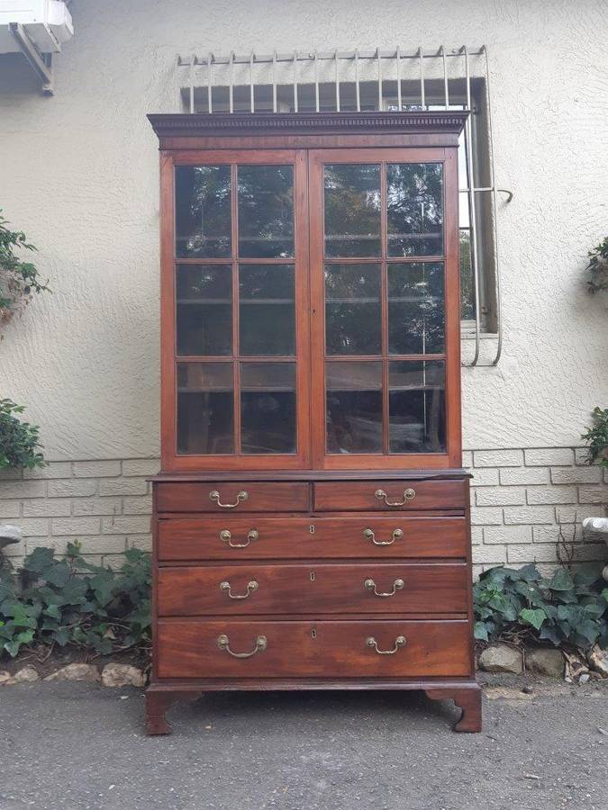 A Georgian Mahogany Bookcase on Chest with Slide-in Shelves & Original Brass Hardware on Bracket ...