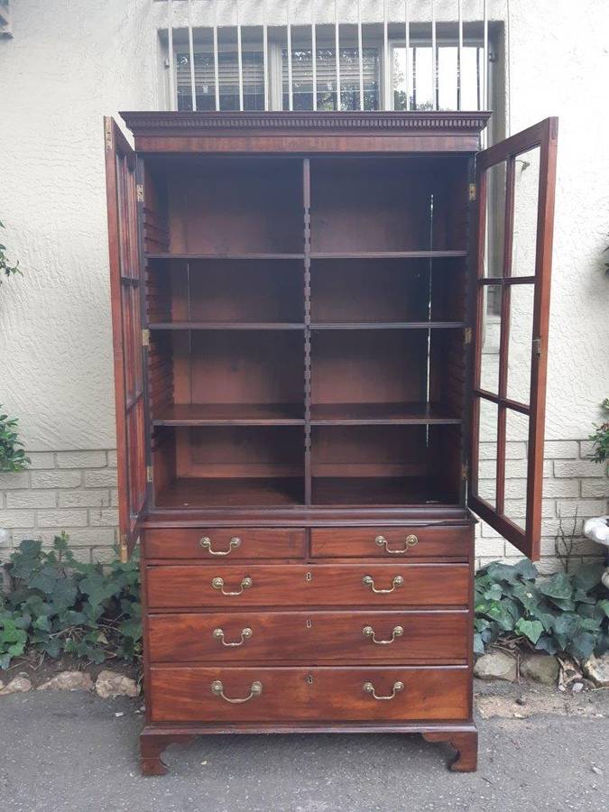 A Georgian Mahogany Bookcase on Chest with Slide-in Shelves & Original Brass Hardware on Bracket ...