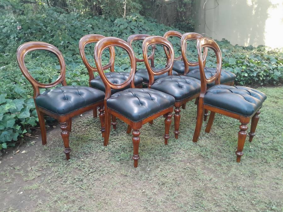 A 19th / Early 20th Century Victorian Set of Eight Bustle Back Dining Chairs Upholstered in a Dee...