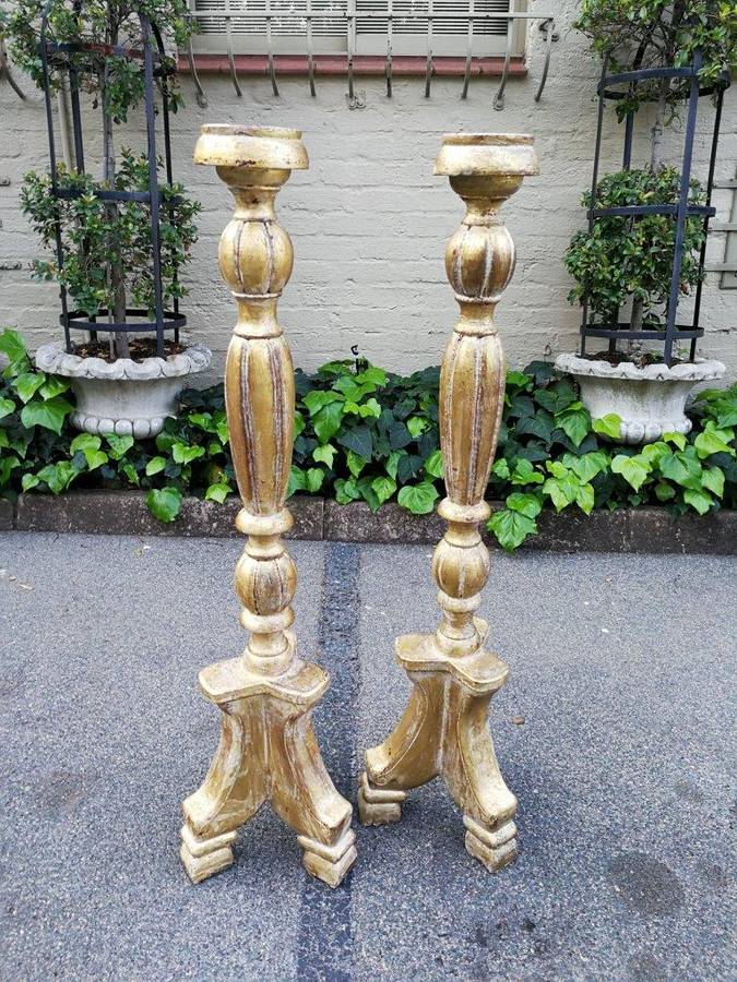 A Pair Of Carved Wooden Candle Holders Hand Gilded With Gold Leaf