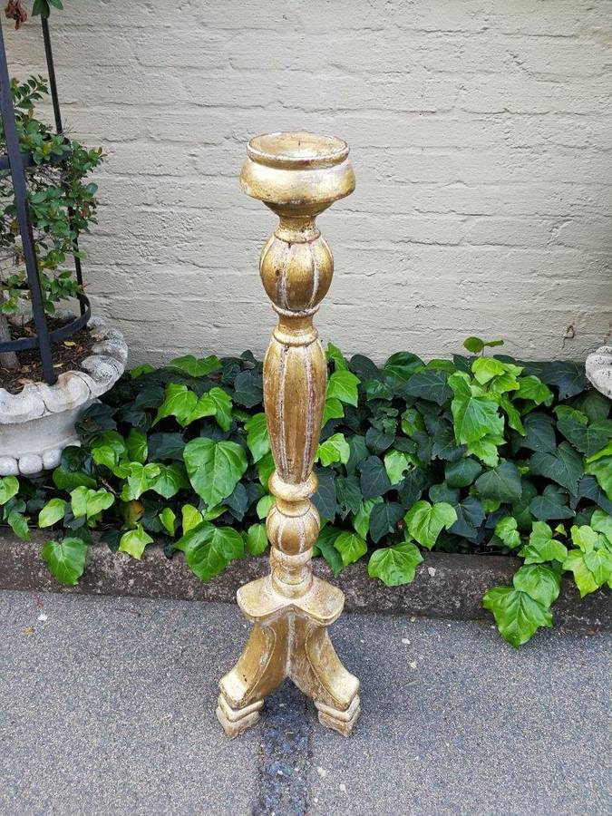 A Pair Of Carved Wooden Candle Holders Hand Gilded With Gold Leaf