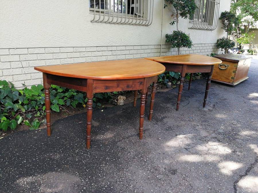 A 19th Century Pair Of Cape Yellowwood And Stinkwood Demi-Lune Tables