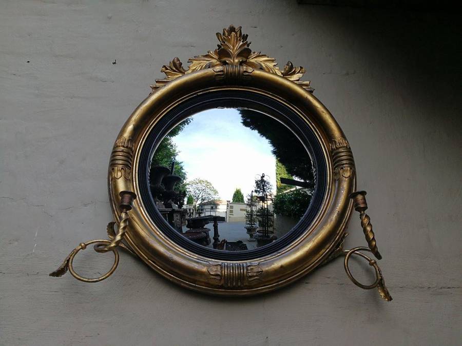 A 19th Century Regency Style Convex Giltwood Mirror