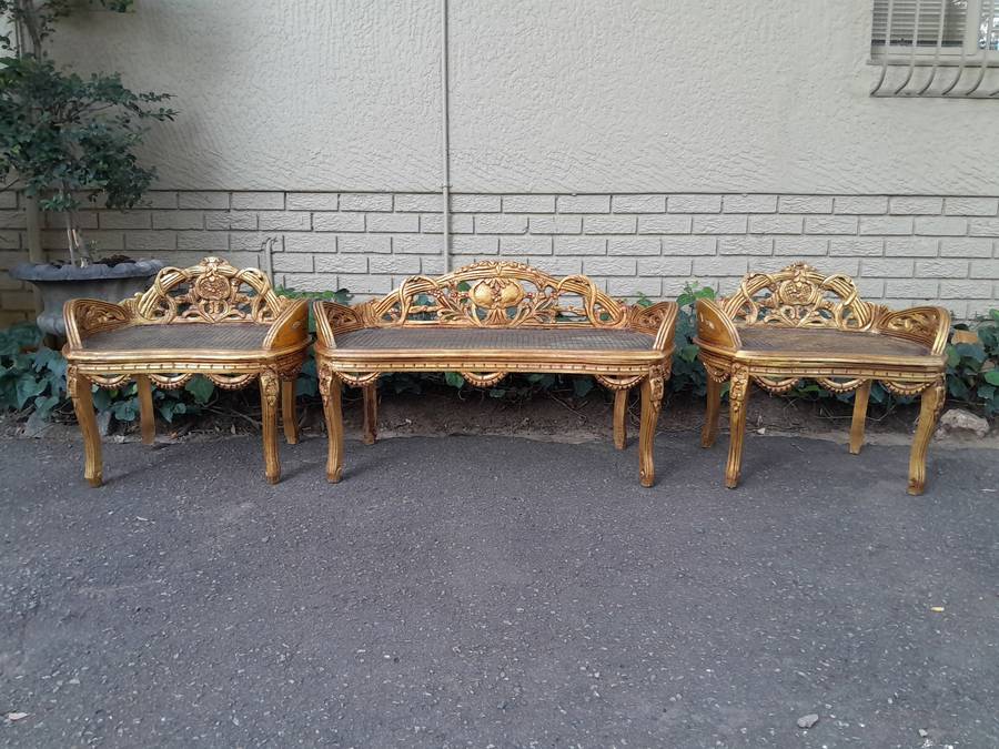 A French Style Set Of Carved and Hand-Gilded Rattan Settee With Two Chairs