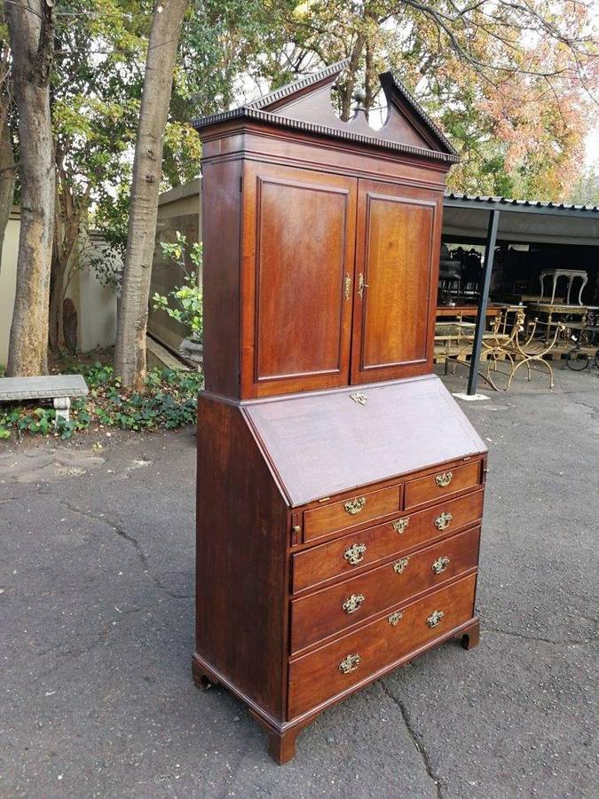 An early 19th Century George III oak bureau bookcase