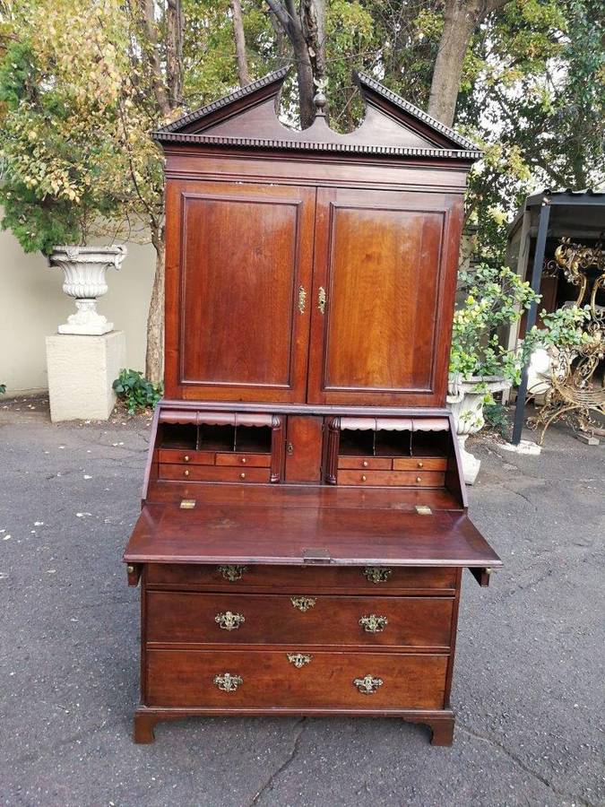 An early 19th Century George III oak bureau bookcase
