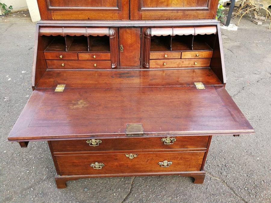 An early 19th Century George III oak bureau bookcase