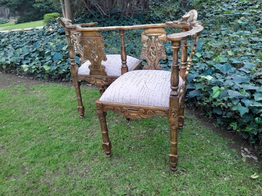 An Antique French-Style Carved Conversation Settee Hand-Gilded and Upholstered in a Custom-made S...