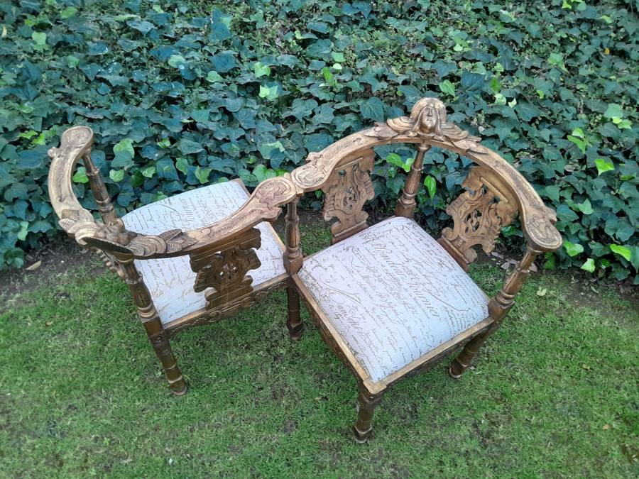An Antique French-Style Carved Conversation Settee Hand-Gilded and Upholstered in a Custom-made S...