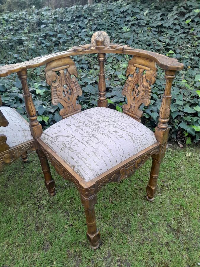 An Antique French-Style Carved Conversation Settee Hand-Gilded and Upholstered in a Custom-made S...