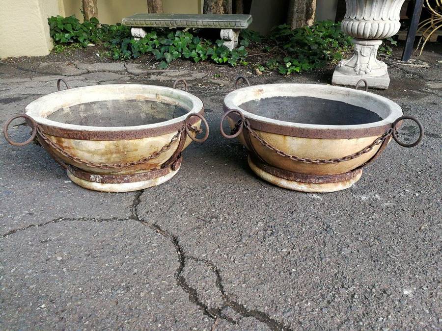 A Vintage Pair Of Terracotta And Wrought Iron Decorative Pots