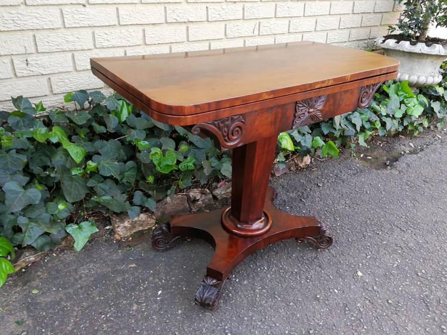 A Victorian Mahogany Folding Card Table on Castors