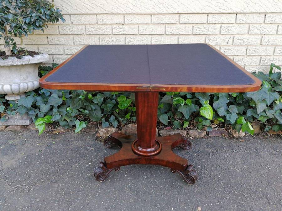 A Victorian Mahogany Folding Card Table on Castors