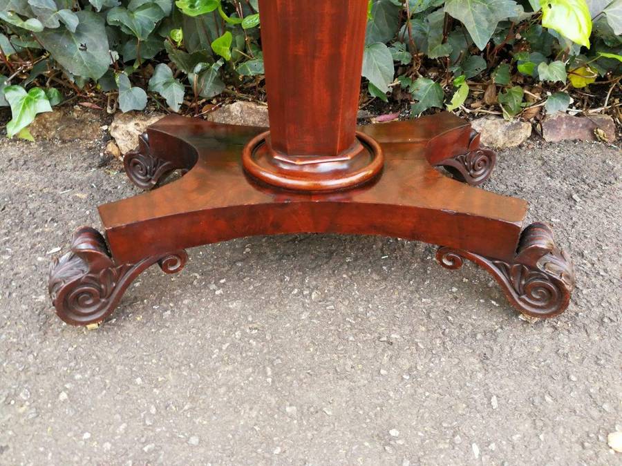 A Victorian Mahogany Folding Card Table on Castors
